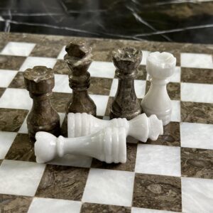 marble chess pieces grey white
