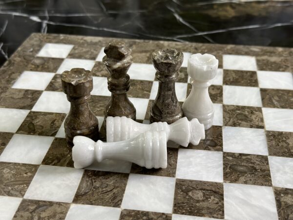 marble chess pieces grey white