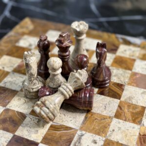 marble chess pieces red coral
