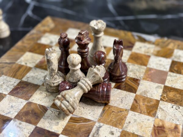 marble chess pieces red coral